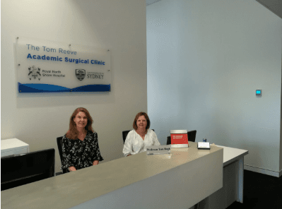 Nicola and Vanessa at the Tom Reeve Academic Surgical Clinic reception desk